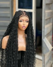 Knotless braided wig. Box braids made on a full lace wig. Black .30  long.