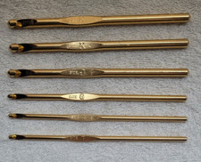 Preowned Set of 6 Gold Made in Japan Inline Metal Crochet Hooks K,K,J,G,F, and F