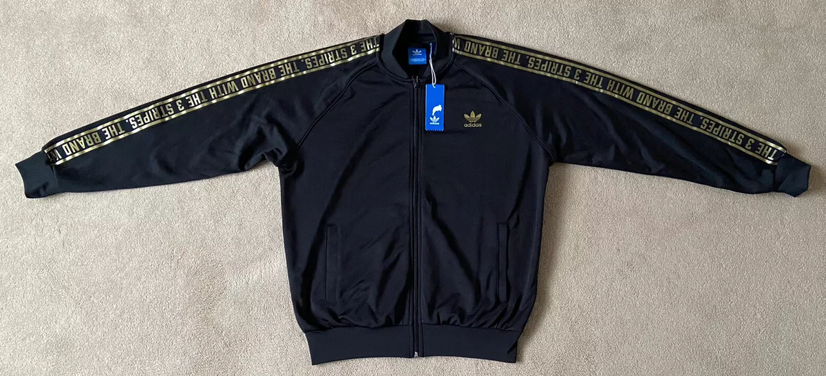 Adidas jacke best sale schwarz goldene streifen