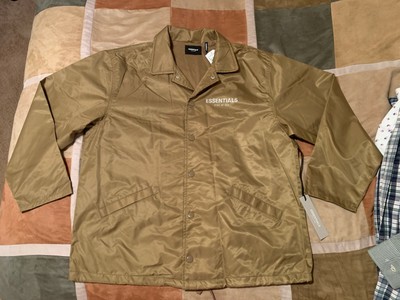 fear of god essentials nylon coach jacket