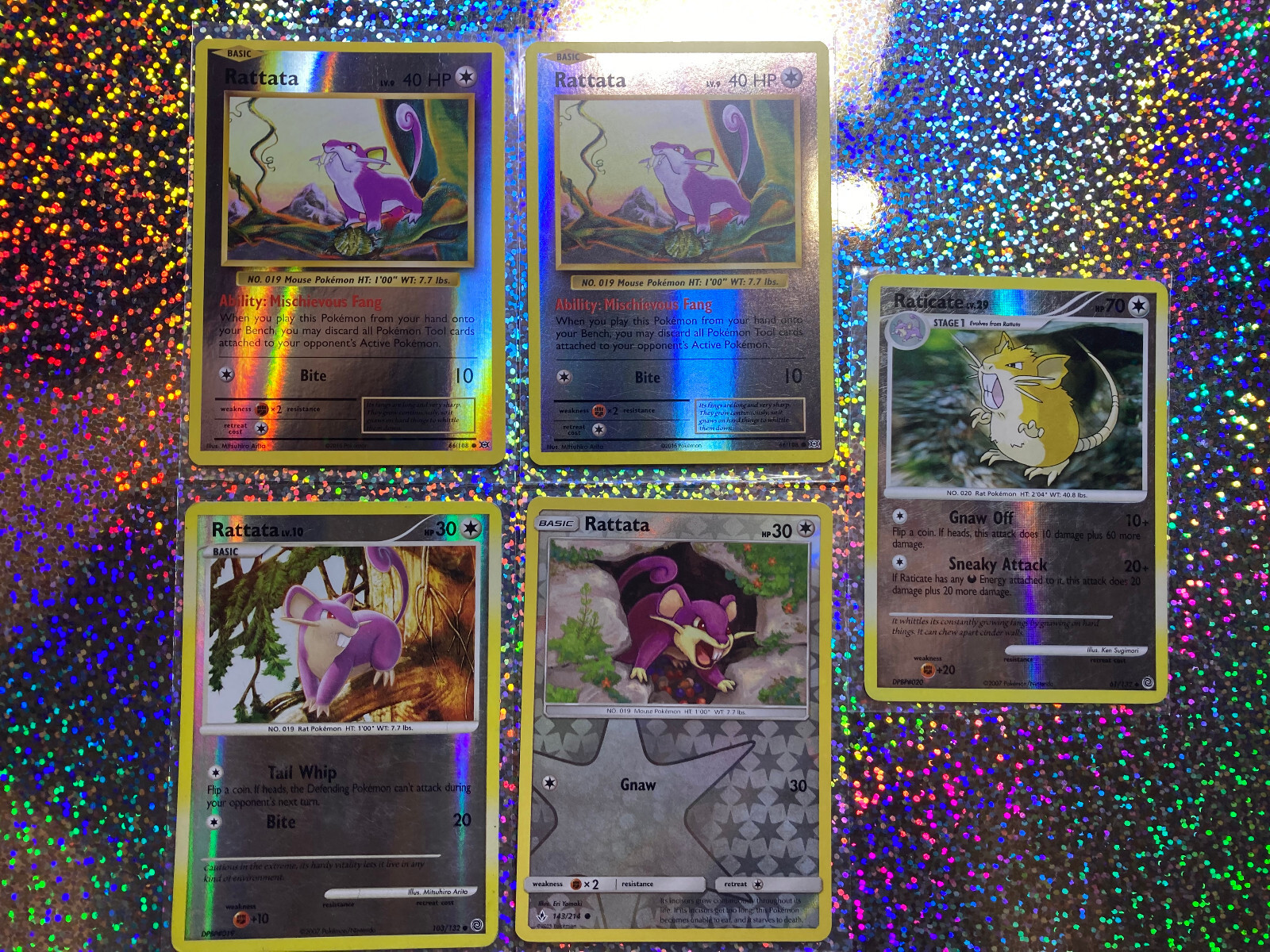 Pokemon TCG Reverse Holo Rattata: Unbroken Bonds 143/214; Evolutions 66/108