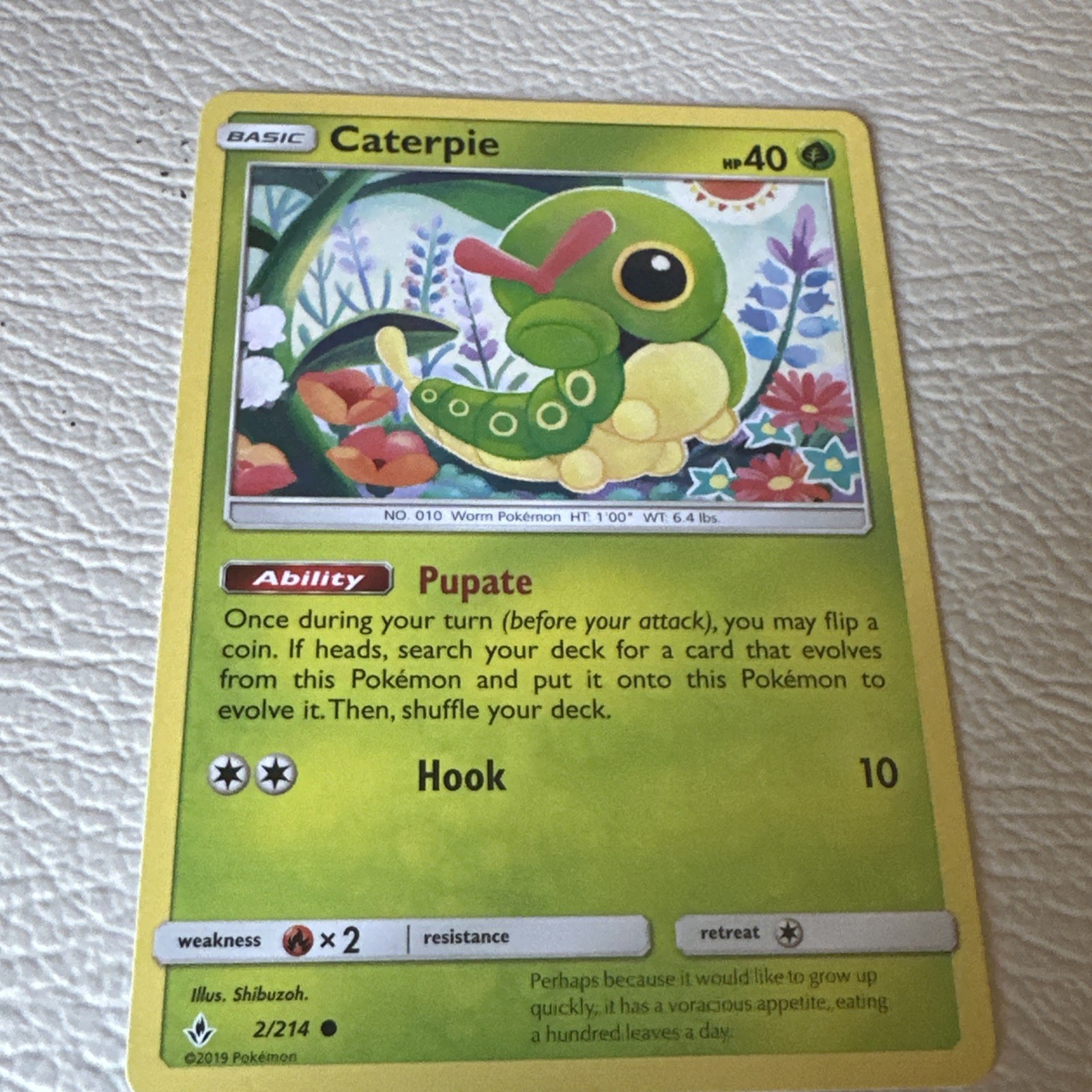 Caterpie 2/214 Sun & Moon Unbroken Bonds Common Pokémon Card 2019