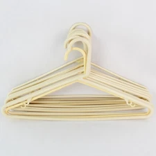 Lot of 10 Cream Colored Plastic Tubular Clothes Hangers With Hooks
