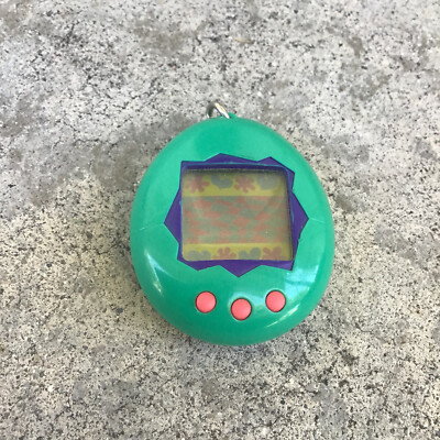 Vintage Tamagotchi by Bandai 1997 Green Purple Pink | eBay
