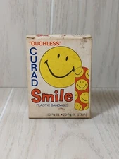 Curad smile Vintage bandages in worn, discolored box ONLY 9 bandages