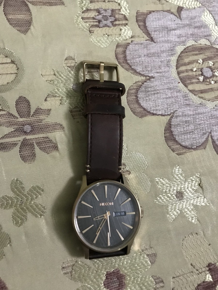 Nixon Never Be Late The Sentry Day Date Gold Tone Textured Dial