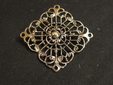 Vintage Filigree Silver Tone Brooch With Center Rhinestone
