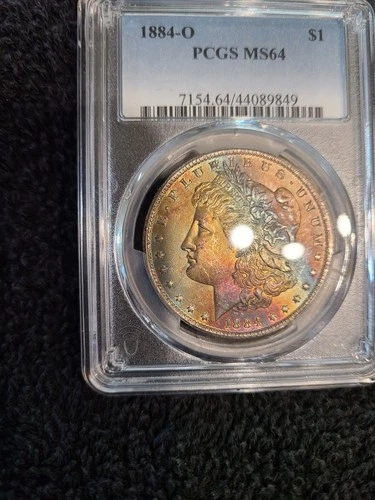 1884-O Rainbow toned Morgan Silver Dollar PCGS MS64