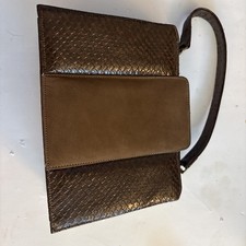 vintage brown box-style handbag features a textured snakeskin exterior