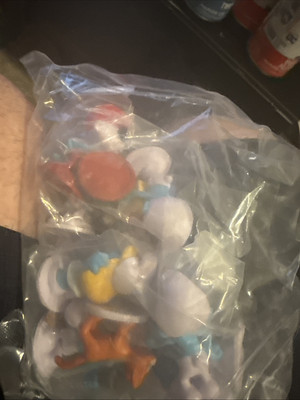 12 piece Smurf cake Toppers brand new in the package never opened
