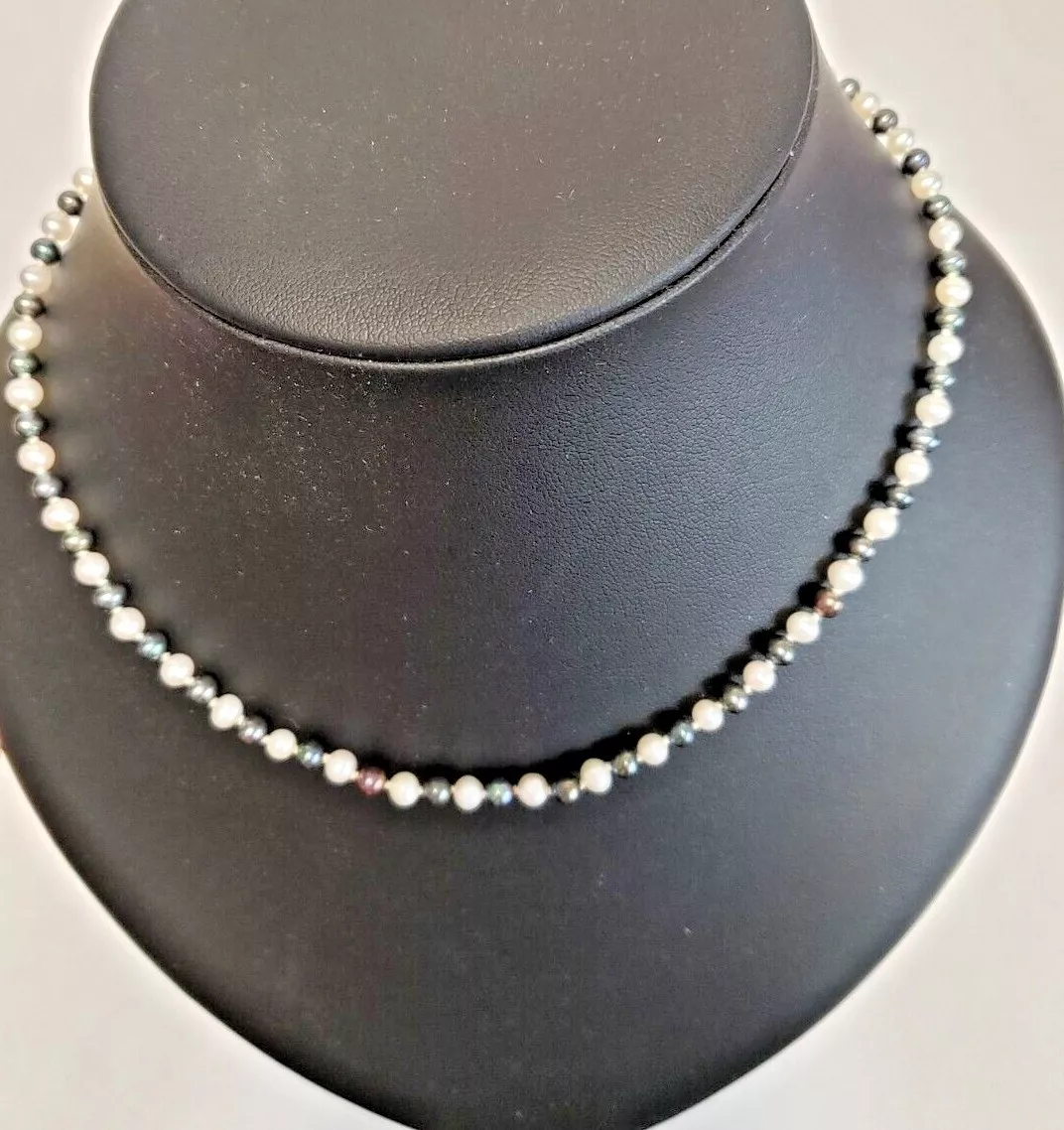 Pearl necklace. 24 inch. 4 5mm black white freshwater pearls