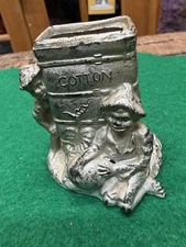 ANTIQUE ORIGINAL 1884 NEW ORLEANS COTTON EXPOSITION FIGURAL METAL MATCH HOLDER