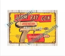 HILLER ATOM RAY GUN childhood toy metal tin sign man cave room wall art