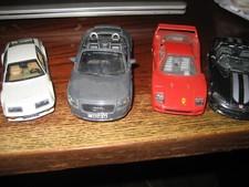 Burago,maisto,universal hobbies lot de 4 vehicules divers etat