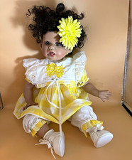 Girl Baby Doll, Black Curly Hair, Blue Eyes, Light Complexion, Yellow Dress