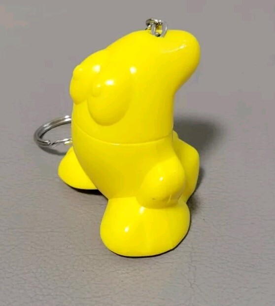 Vintage 1990s Crazy Bones Keychain Eggy Yellow Plastic Character