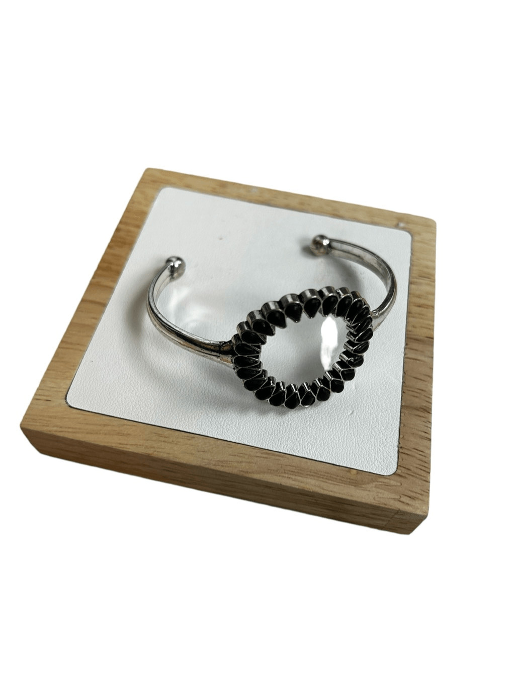 Silver and black open circle patterned cuff brace… - image 1