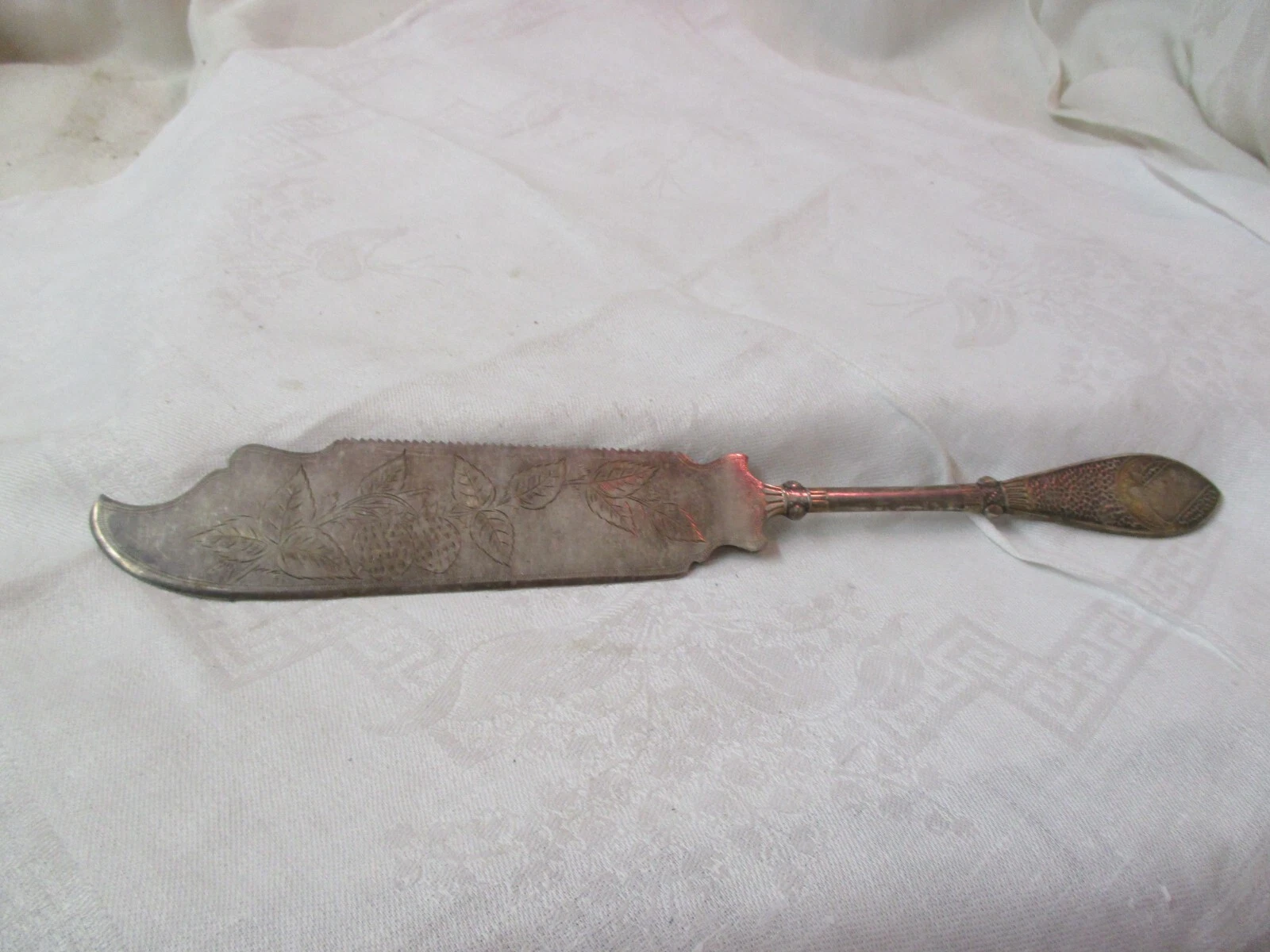 1883 Reed & Barton Silver plated serrated Ice Cream Knife Pompeiian mono 'A'