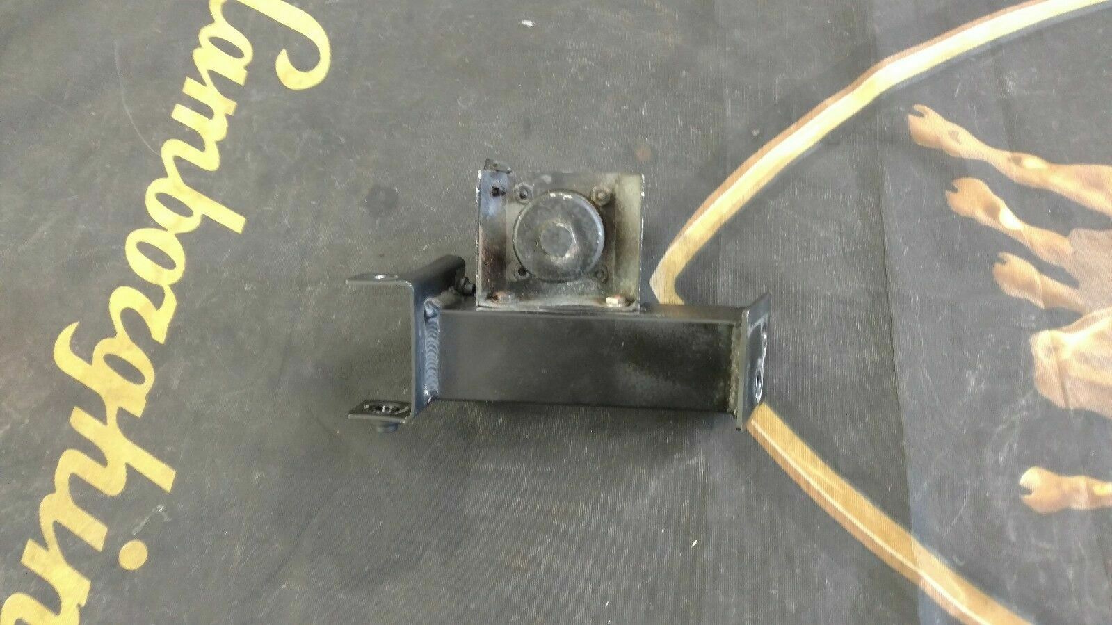LAMBORGHINI GALLARDO REAR LEFT BUMPER EXHAUST MOUNTING BRACKET OEM 400813729