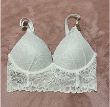 Victoria's Secret PINK White Lace Bra size XS. Padded in pink. Pullover
