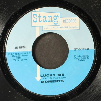 MOMENTS: lucky me / i lost one bird in the hand STANG 7'' Single 45 RPM