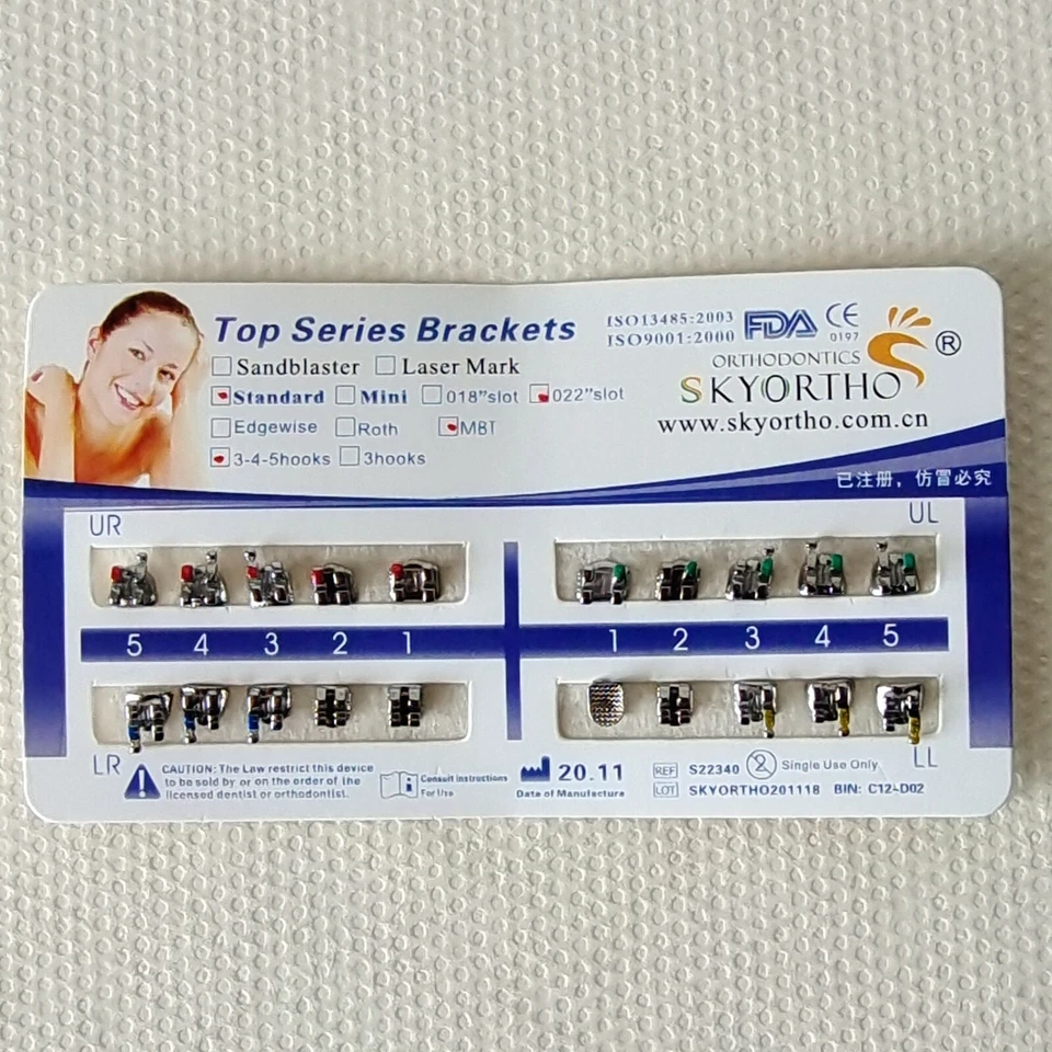 Brackets metálicos para ortodoncia dental estándar MBT 022 ganchos 3 4 5 Foto 4 de 4