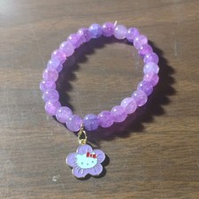 Hello Kitty Fioletowa bransoletka z koralików z kwiatowym urokiem