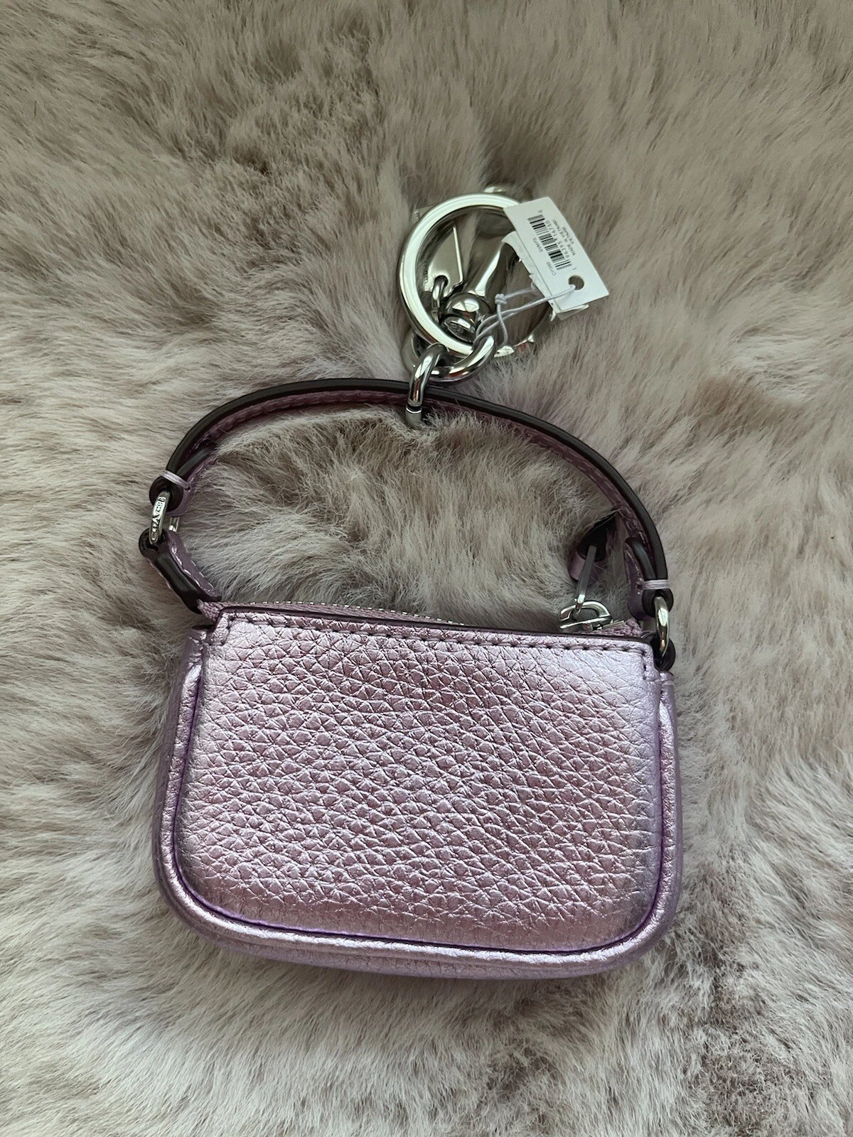 Borsa a mano Coach Mini Nolita nuova con etichette ciondolo portachiavi lilla metallica