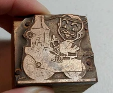 Vintage Letterpress Printing Block Man Driving Roller Machine? Tank Dial Gauge