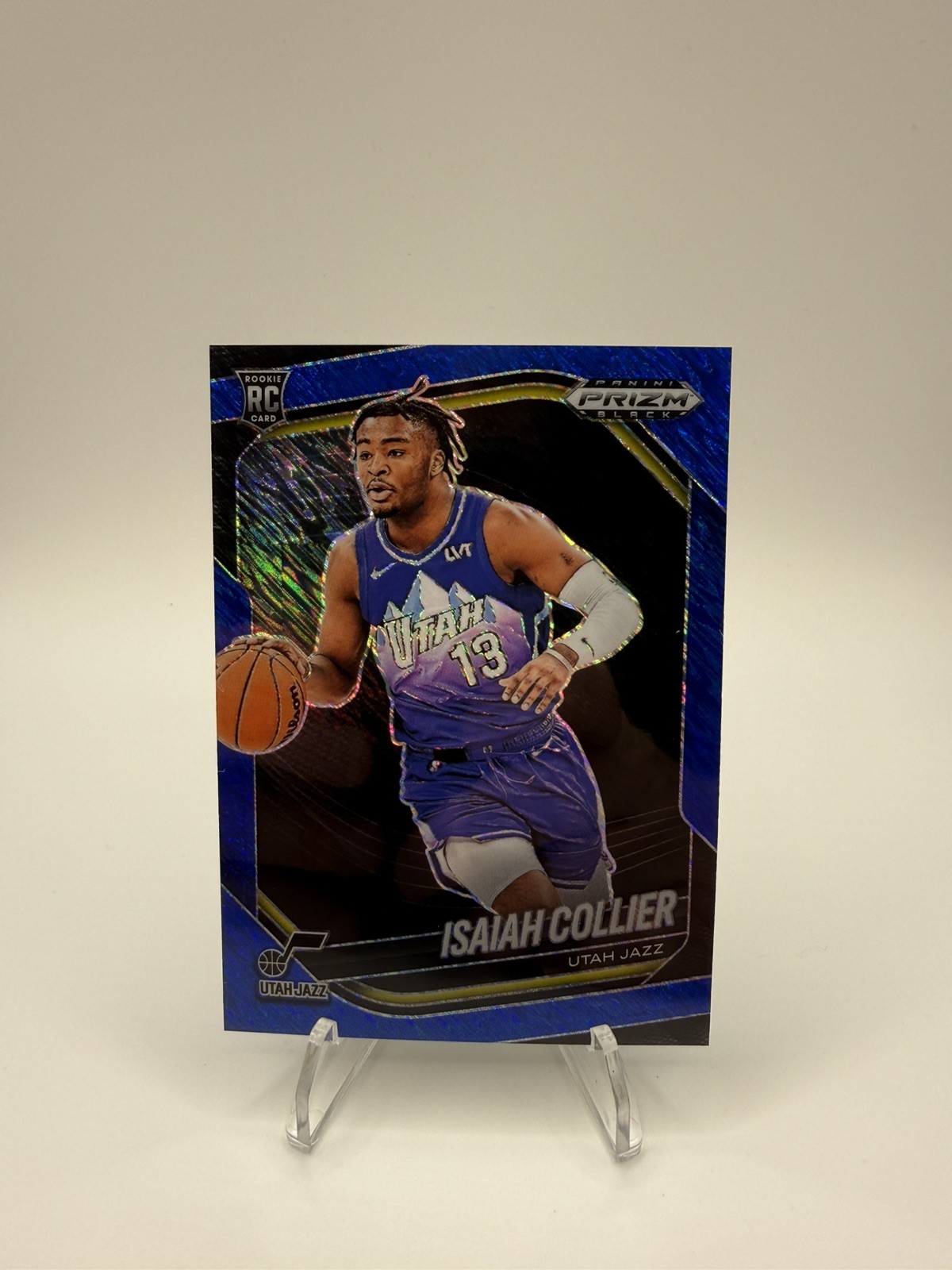 2024-25 Panini Prizm Black - Isaiah Collier #32 Blue Shimmer /35 (RC) *Book End*