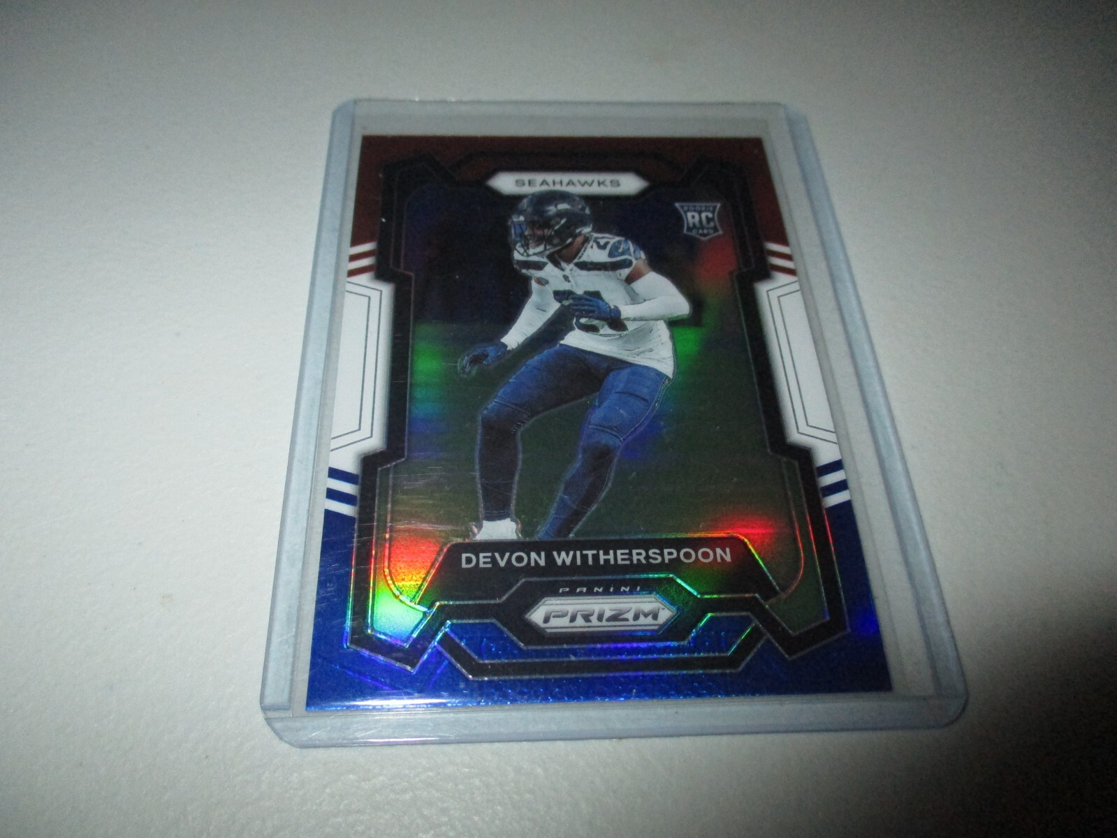 Devon Witherspoon 2023 Panini Prizm Red White Blue RC #389