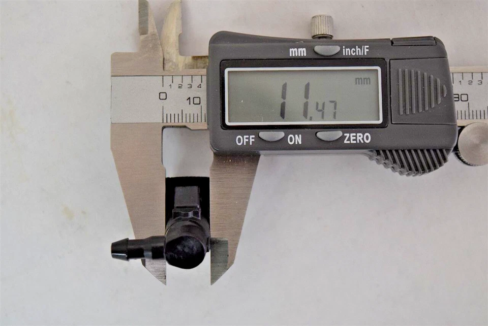 Par de pulverizadores de chorro de boquilla de lavado de parabrisas GM 20911558 para Cadillac XTS 2013-2019 Foto 2 de 4