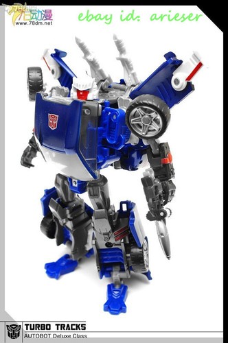 Takaratomy United Series Un-13 Autobot Tracks versión japonesa Figura de acción nueva - Imagen 2 de 9