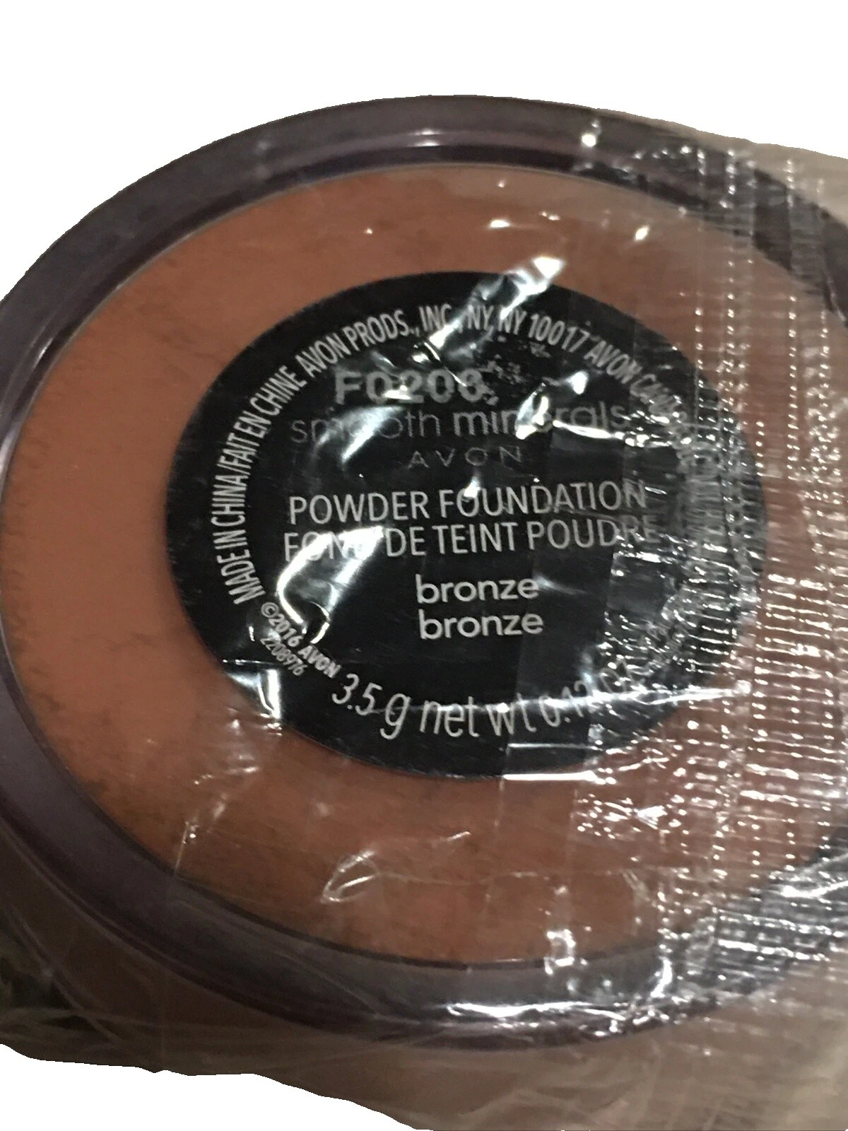 Base en polvo suelto Avon Beige