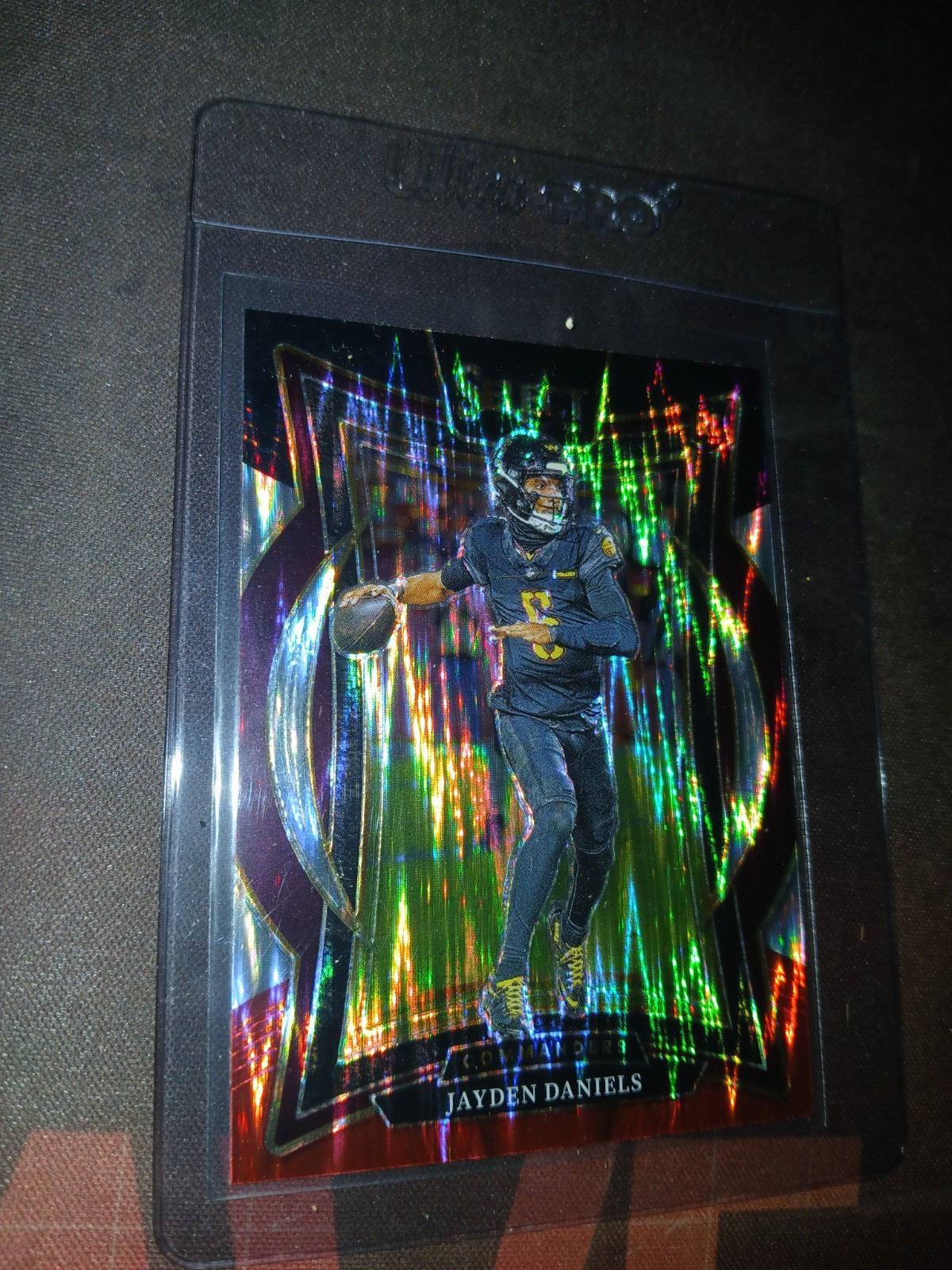 2024 Panini Select - Concourse Jayden Daniels #26 Black & Red Shock Prizm (RC)