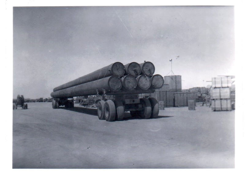 PHOTOGRAPH TRUCK GAS PIPES TAPLINE OIL PIPELINE MISHAB JUBAIL SAUDI ARABIA PHOTO