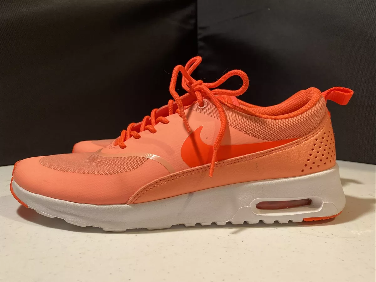 Nike thea best sale orange