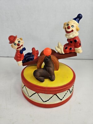 CIRCUS CLOWNS TEETER TOTTERING WITH SEAL FIGURINE MUSIC BOX- NEEDS REPAIR