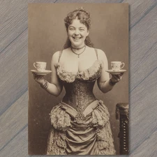 POSTCARD Victorian Woman Corset Holding Tea Cups Sepia Antique Humor