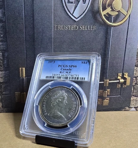 1973 Canada Silver Dollar PCGS SP66 R.C.M.P. BEAUTY Rainbow Toned Reverse