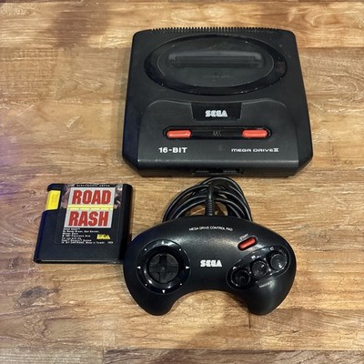 Sega Mega Drive 2 Konsole mit Controller und Spiel für Ersatzteile oder funktioniert nicht