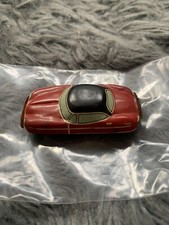 vintage Small 1950 s red tin made in japan two door car Coupe