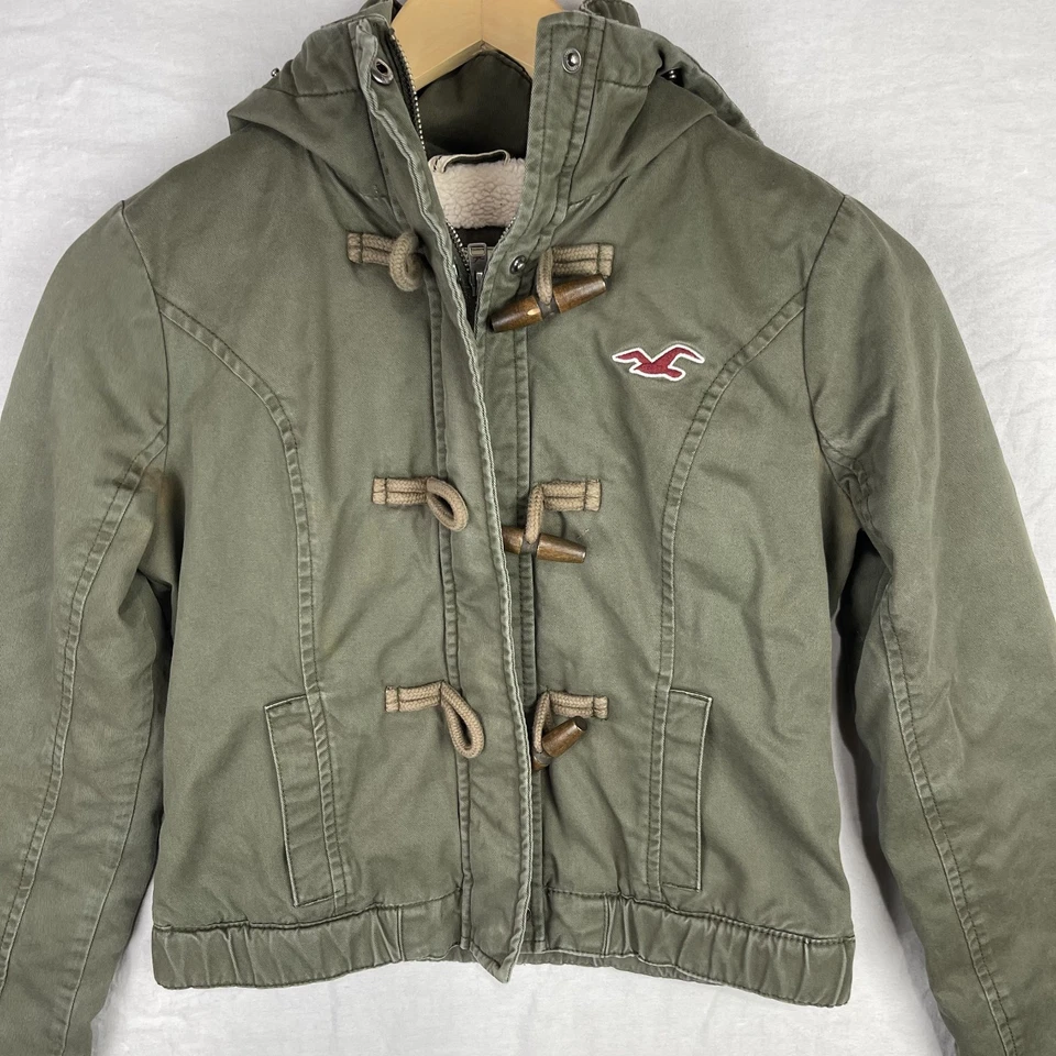Chaqueta Hollister Mujer Mediana Verde Sherpa Forrada Palanca Logo Con Capucha Parka Cálida Foto 2 de 4