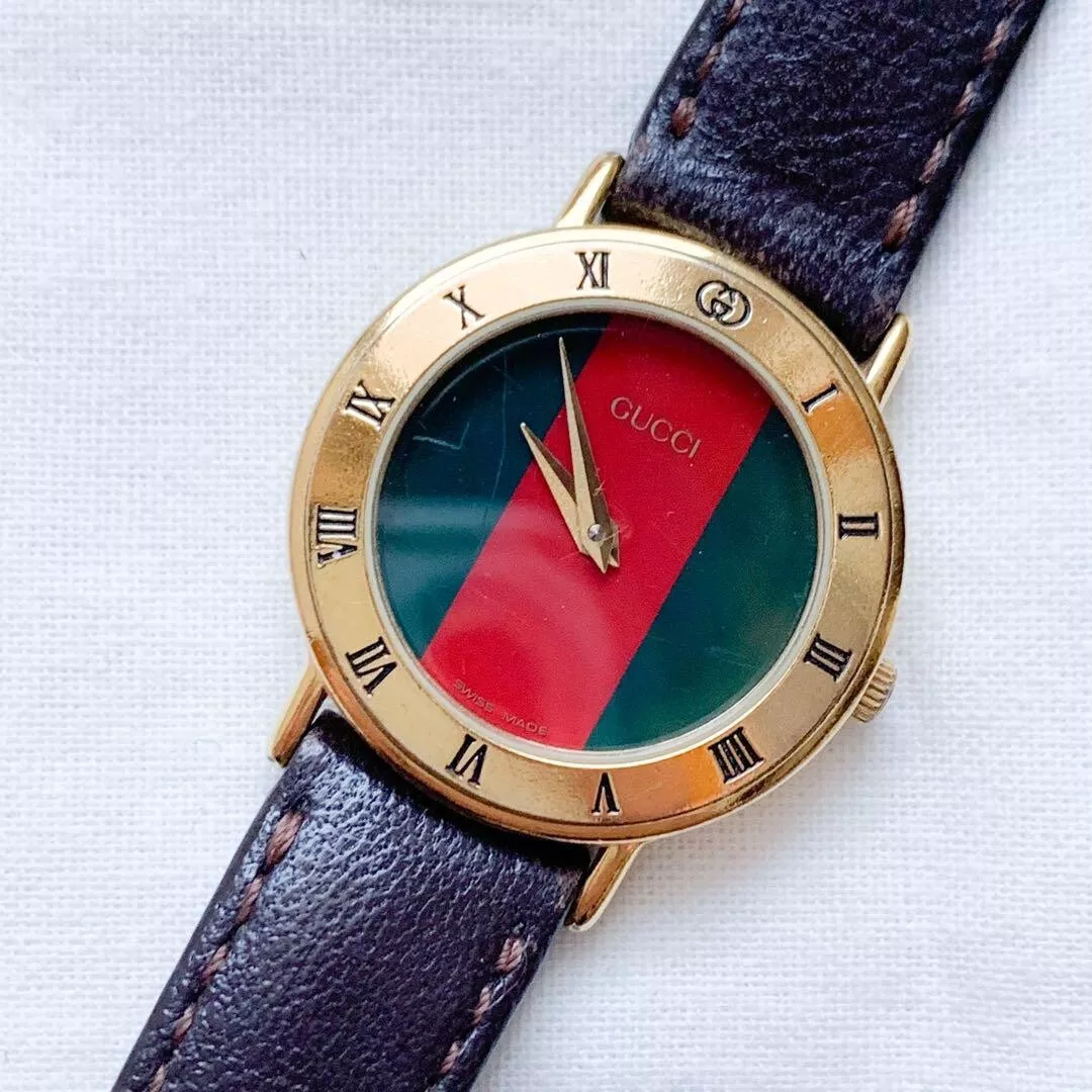 Montre Gucci 3000,2 L quartz 26 mm cadran femme ligne sherry fabrication suisse ronde Japon