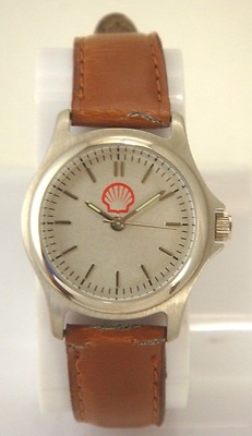 COLLECTIBLE SHELL GAS LADIES WATCH IN SILVER TONE CASE