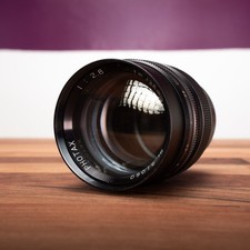 Photax pre-set lens 135mm f/2.8. M42 mount EXC cond. W/Original caps PLU:S15