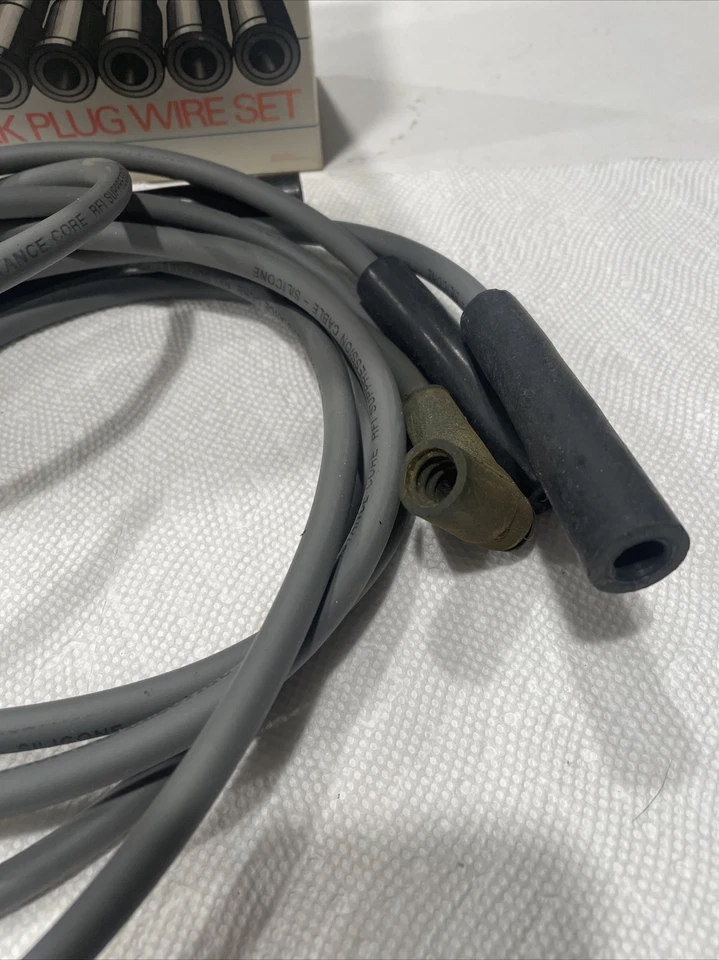 Juego de cables de bujía eléctrica Packard 8 mm 76-86 Chevette 82-87 Pontiac T-1000 NOS Foto 2 de 4