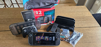 Nintendo Switch 2 OLED Console Bundle W/ Pro controller + dbrand Killswitch