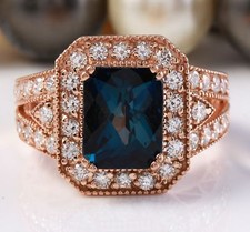 7.40 Carat Natural London Blue Topaz and Diamonds in 14K Solid Rose Gold Ring