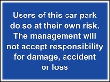 The users of this car park do so at their own risk safety sign 